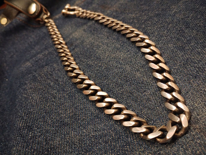 INCEPTION HORSE BUTT LEATHER BRASS CHAIN